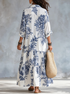 Dahlia™ | Bohemian Blue Floral Tiered Maxi Dress with Button-Down Detail